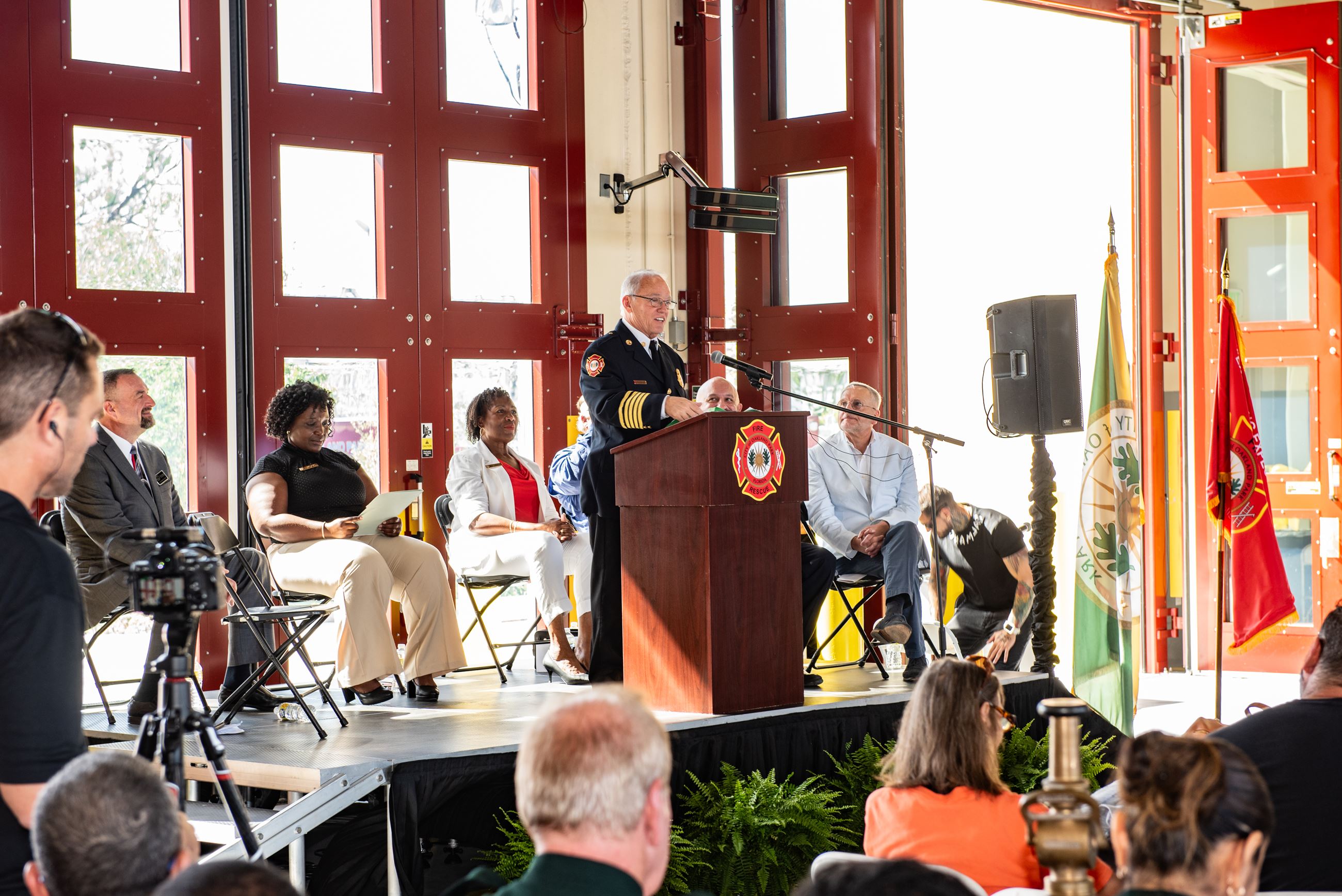 Photo of fire chief giving remarks at ribbon cutting